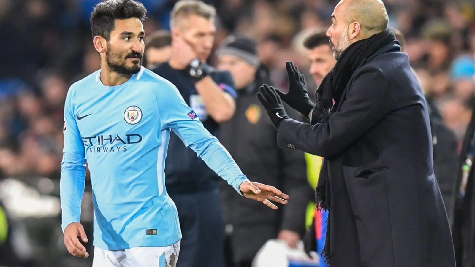 Wieder vereint: Ilkay Gündogan (l) und Pep Guardiola. (Foto: Walter Bieri/KEYSTONE/dpa)