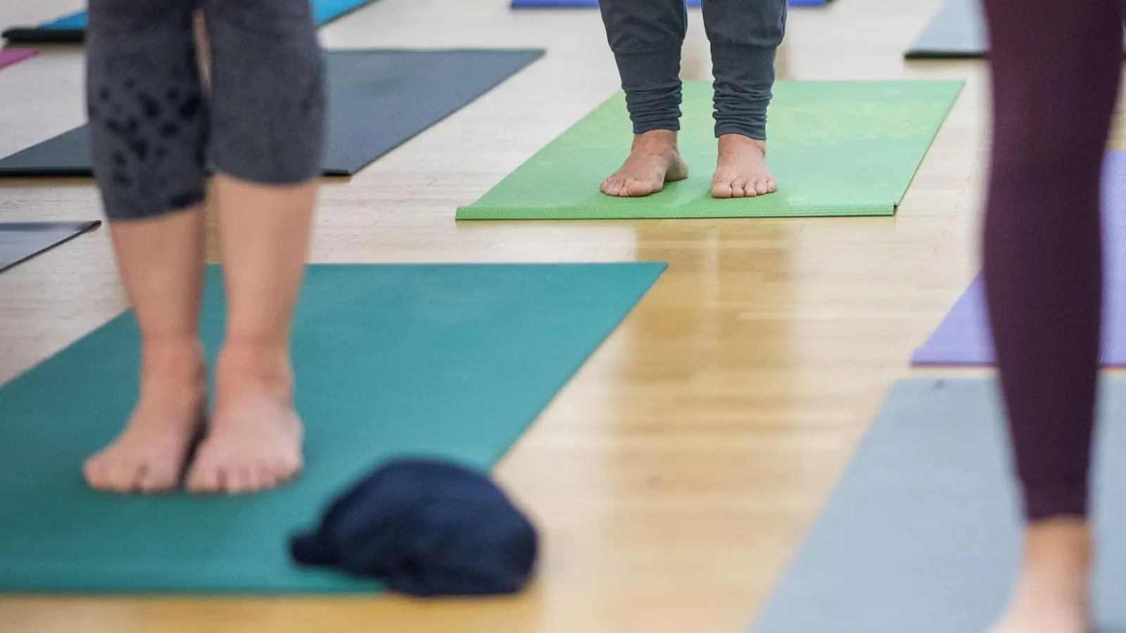 Ein Yoga-Zentrum sollte einer Frau für ihre Arbeit Mindestlohn zahlen - und legte dagegen Verfassungsbeschwerde ein. (Symbolbild) (Foto: Sebastian Gollnow/dpa)