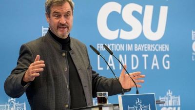 CSU-Parteichef Markus Söder hält eine Abgrenzung von der Politik Angela Merkels für notwendig - vor allem beim Thema Migration. (Foto: Daniel Vogl/dpa)