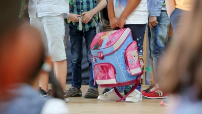 Der erste Schultag ist auch für Eltern ein besonderer Tag. Umso wichtiger ist die Absprache mit den Vorgesetzten, um dabei sein zu können. (Foto: Mascha Brichta/dpa-tmn/Archiv)