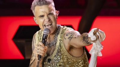 Sieben Auftritte in Deutschland: Für die Konzerte von Superstar Robbie Williams beginnt der Vorverkauf. (Archivbild) (Foto: Michael Buholzer/Keystone/dpa)